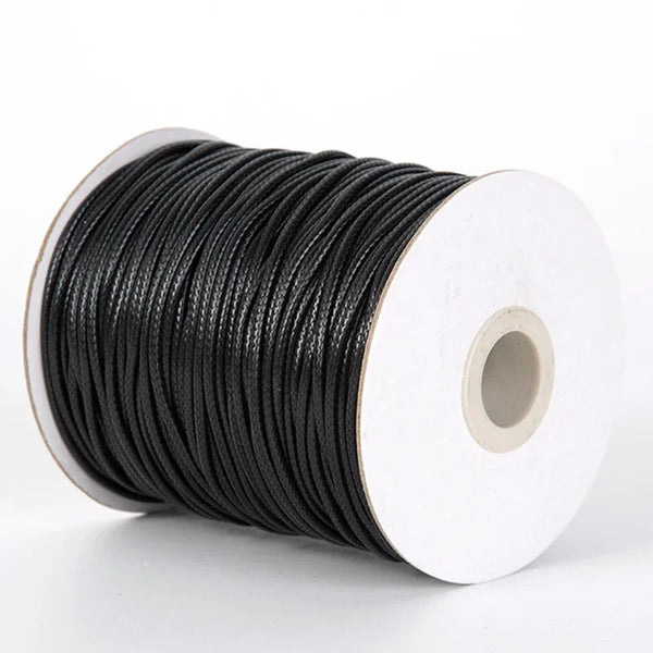 Bobina de cuerda de cordel encerado negro para hacer joyería casera.