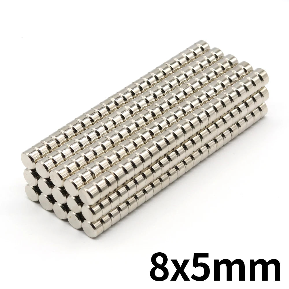 A row of small, silver refrigerator magnets with an 8x5mm size.