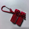 A red precision stair gauge framing square with a silver handle and cross-shaped body.
