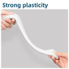 A hand is stretching a white, flexible epoxy putty to demonstrate its strong plasticity for crack repair.