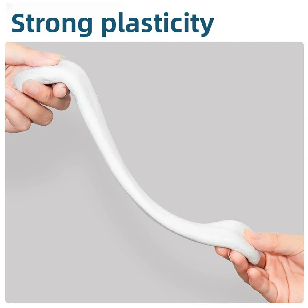 A hand is stretching a white, flexible epoxy putty to demonstrate its strong plasticity for crack repair.