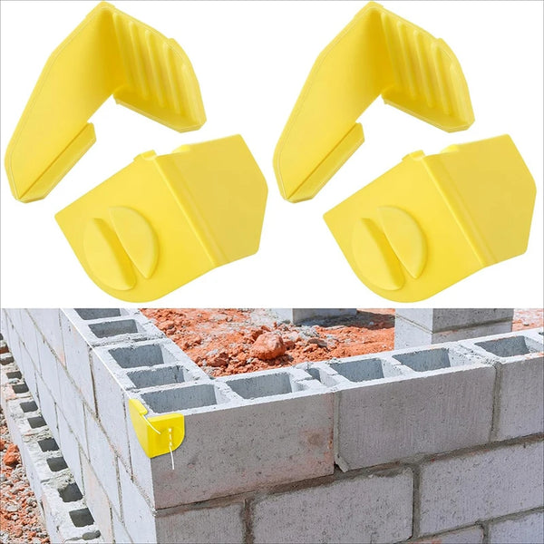 Two yellow precision masonry line holder clips shown against a brick wall.