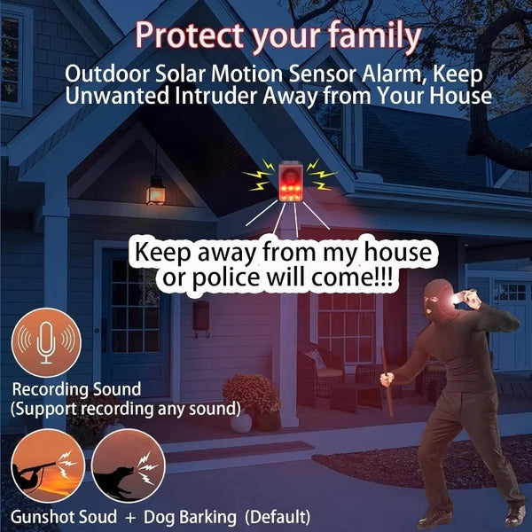 Outdoor solar motion sensor alarm light protecting a house with a person attempting to enter.