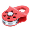 A red heavy duty winch snatch block with a silver handle and mounting plate.