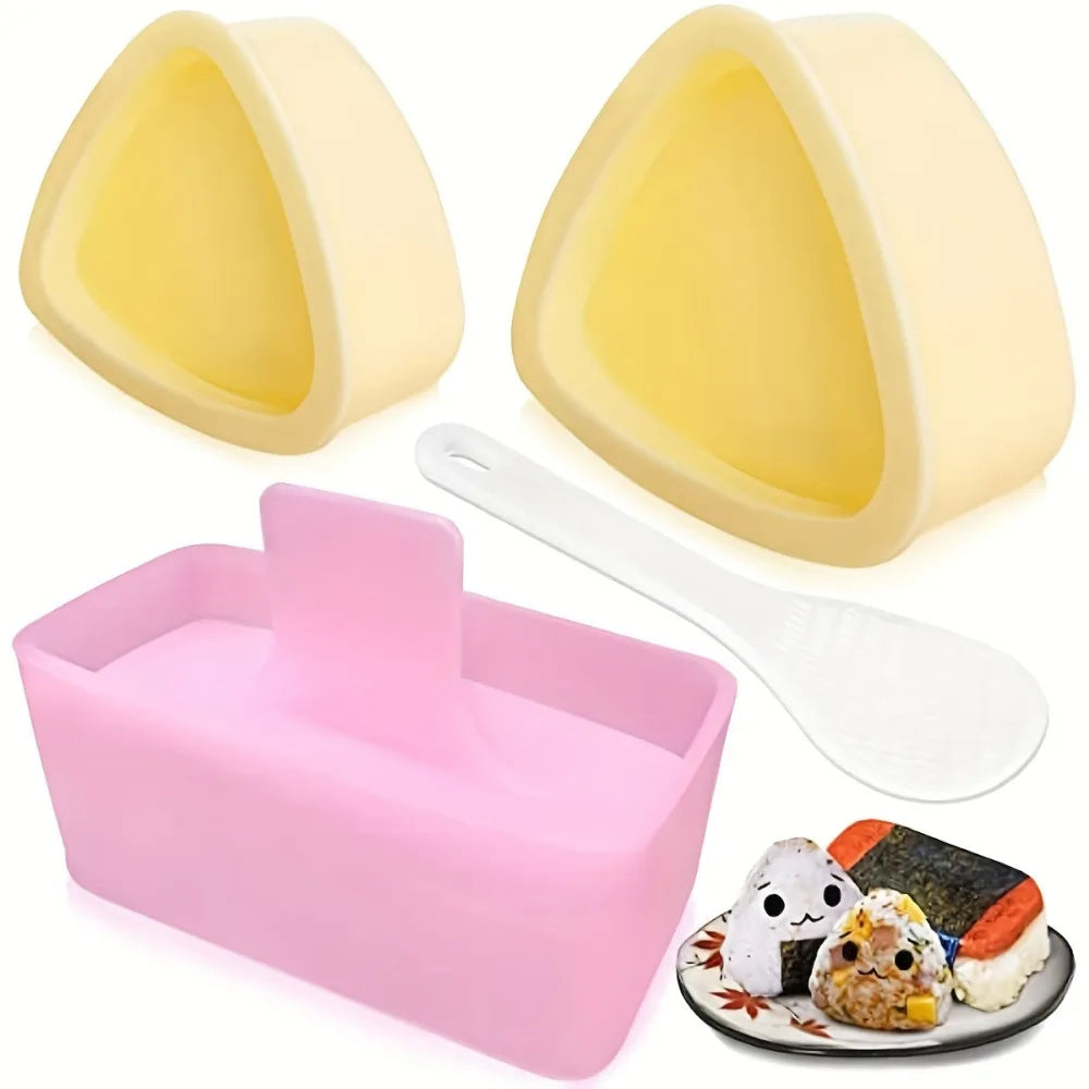 A set of silicone molds for making sushi and onigiri, including yellow and pink shapes.