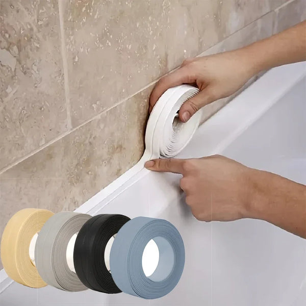 A hand is applying a roll of heavy-duty waterproof sealing tape to the edge of a white bathtub or fixture.