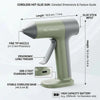 A cordless hot glue gun in a light green color showing its dimensions and features like the fine tip nozzle and ergonomic lon