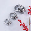 Three heavy-duty stainless steel buckle pulleys are displayed against a white background.