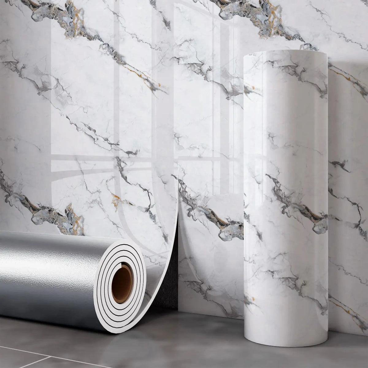Roll of white marble wall decals featuring gray and gold veining on a floor.