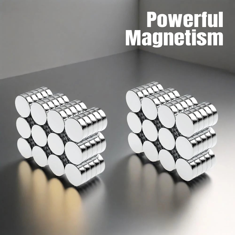 A pair of silver precision refrigerator magnets arranged in rows, demonstrating powerful magnetism.