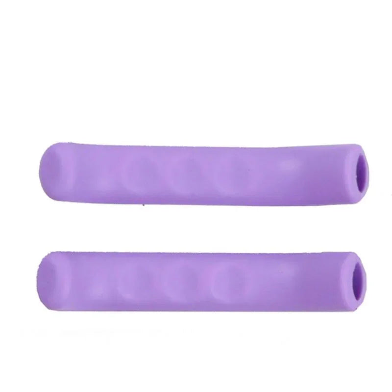 Two purple silicone brake lever protector covers for bicycles