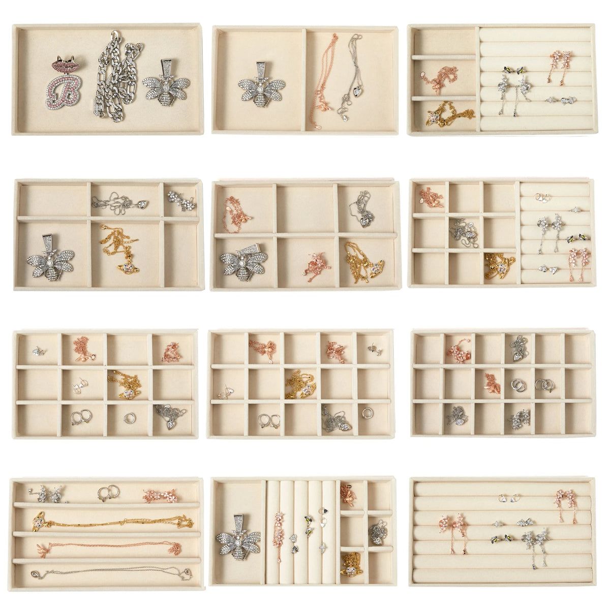 A collection of plush velvet jewelry storage trays displaying various silver and gold-toned jewelry pieces.