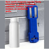 A blue magnetic spray can holder attached to a metal surface, shown next to a white bottle.