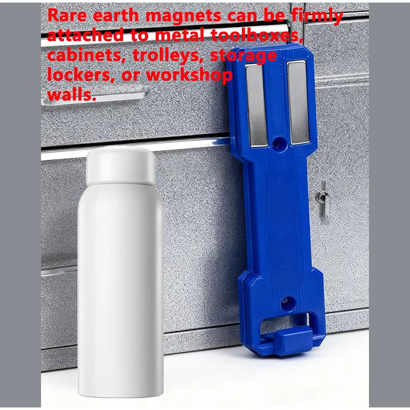 A blue magnetic spray can holder attached to a metal surface, shown next to a white bottle.