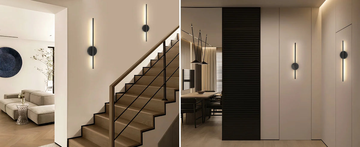 Interior moderno con escalera y apliques de pared con luminarias giratorias.