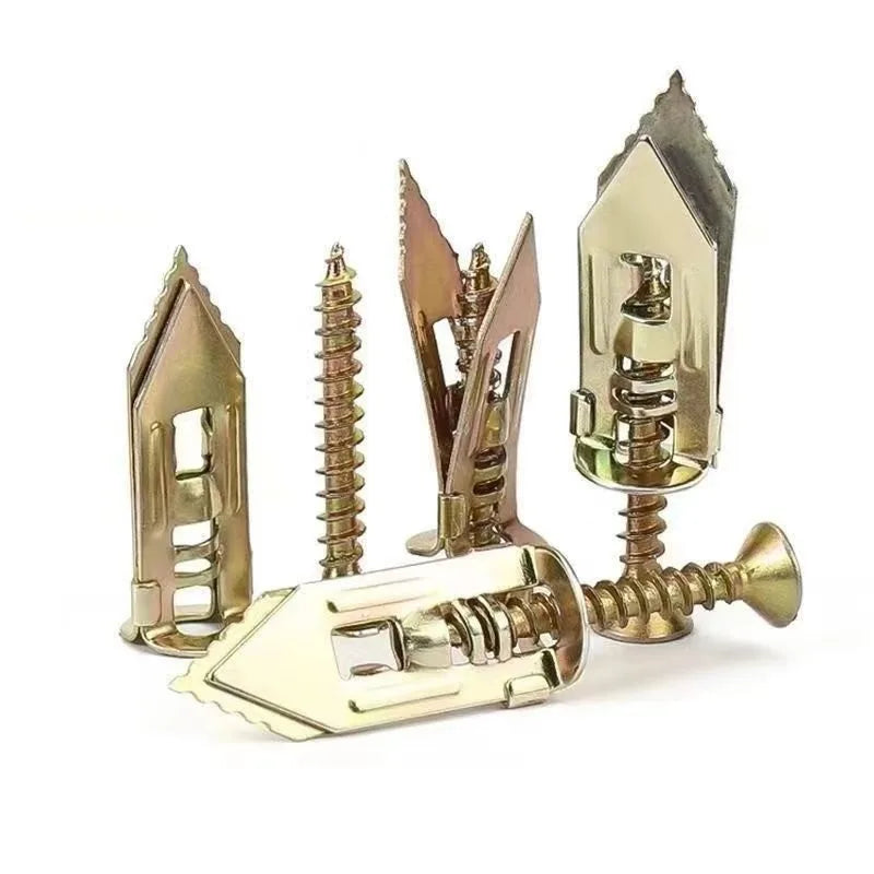 A set of brass self-drilling drywall anchors and screws for home DIY projects.