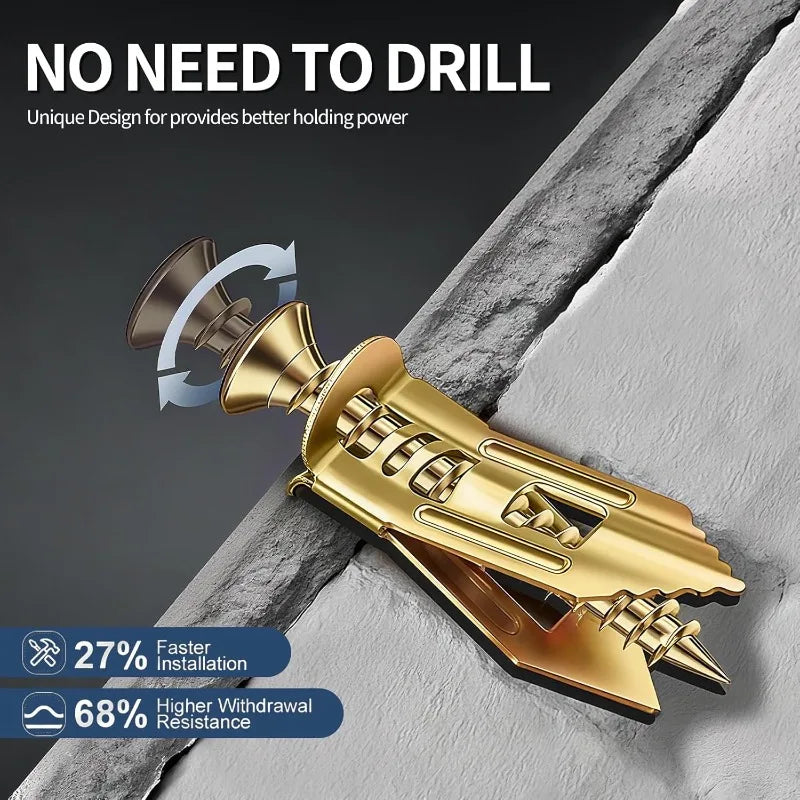 A gold-colored self-tapping drywall expansion anchor is shown being installed into a gray wall surface.