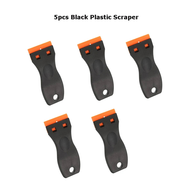 Five black plastic scrapers with orange tips for removing labels and decals