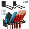 Two black heavy duty tool storage racks with multiple tool holders and various colored tools.