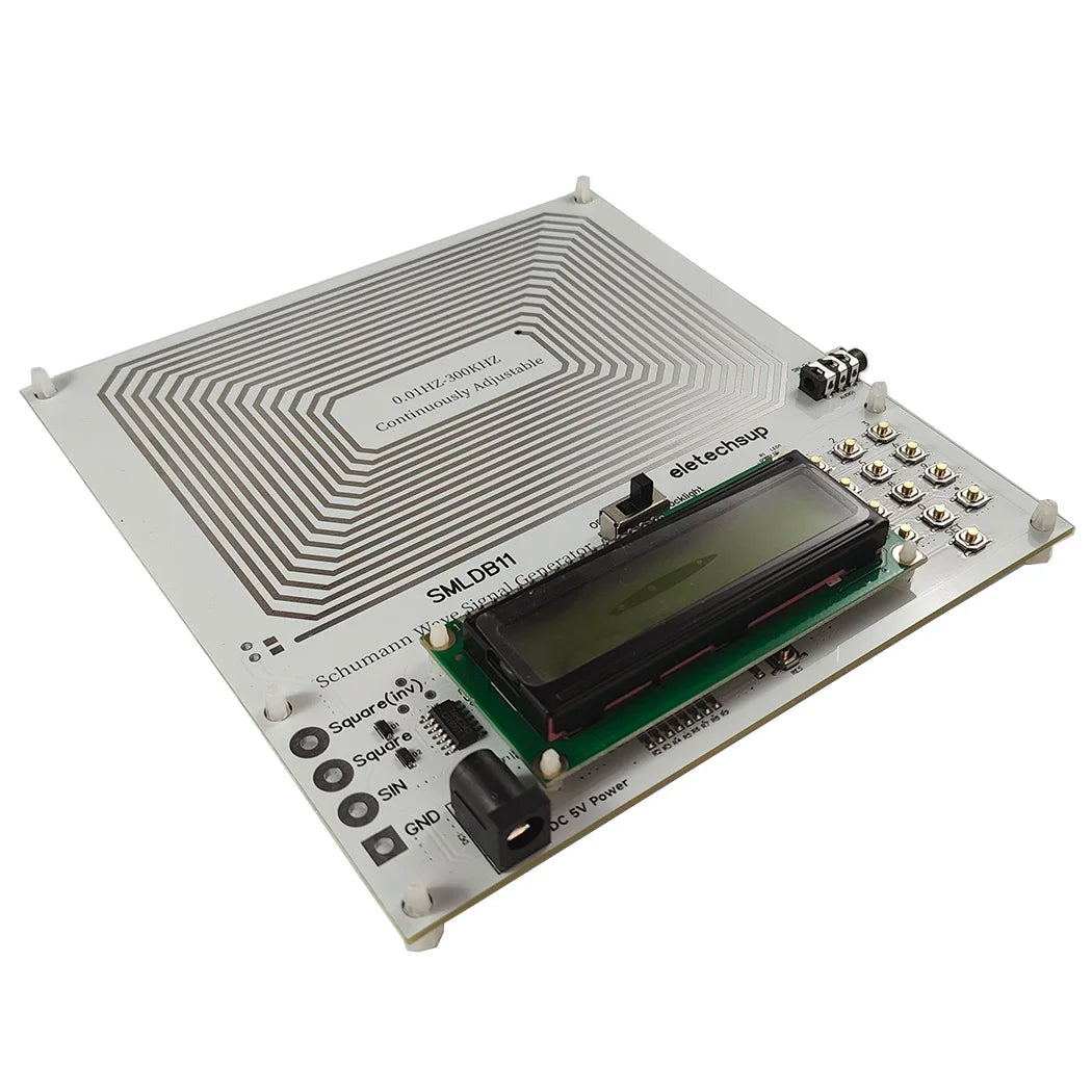 A flat electronic board with a green component and various connectors, labeled as an electromagnet frequency generator.