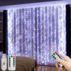 A hand holds a remote control for multi-mode fairy garland lights illuminating a sheer curtain.