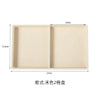 A light beige jewelry storage tray with two compartments, measuring 10cm by 12.3cm.