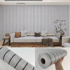 A close-up view of a cylindrical wood grain slat wall panel sticker in gray and white tones.