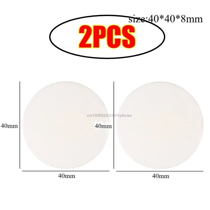 Two white silicone door handle bumpers for wall protection, each measuring 40mm by 40mm by 8mm.