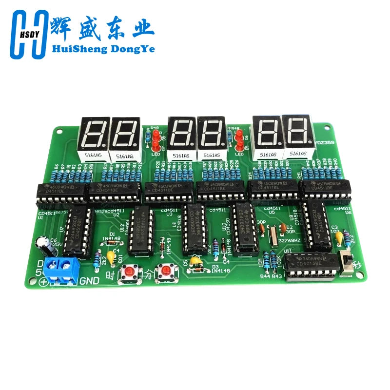 A green printed circuit board with multiple digital displays and electronic components for a DIY digital clock kit.