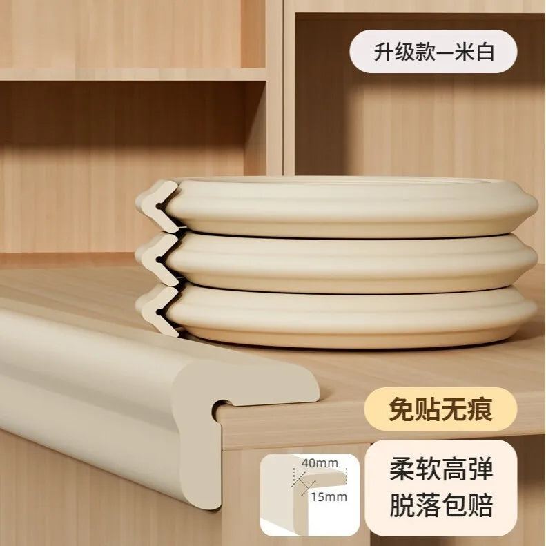 A set of beige plastic corner and table edge guards for baby safety, shown in a wooden cabinet context.