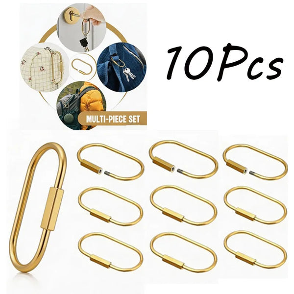 A set of ten brass gold key ring carabiner clips and bag charms displayed in various angles.