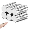A stack of round, silver magnetic fridge stickers.