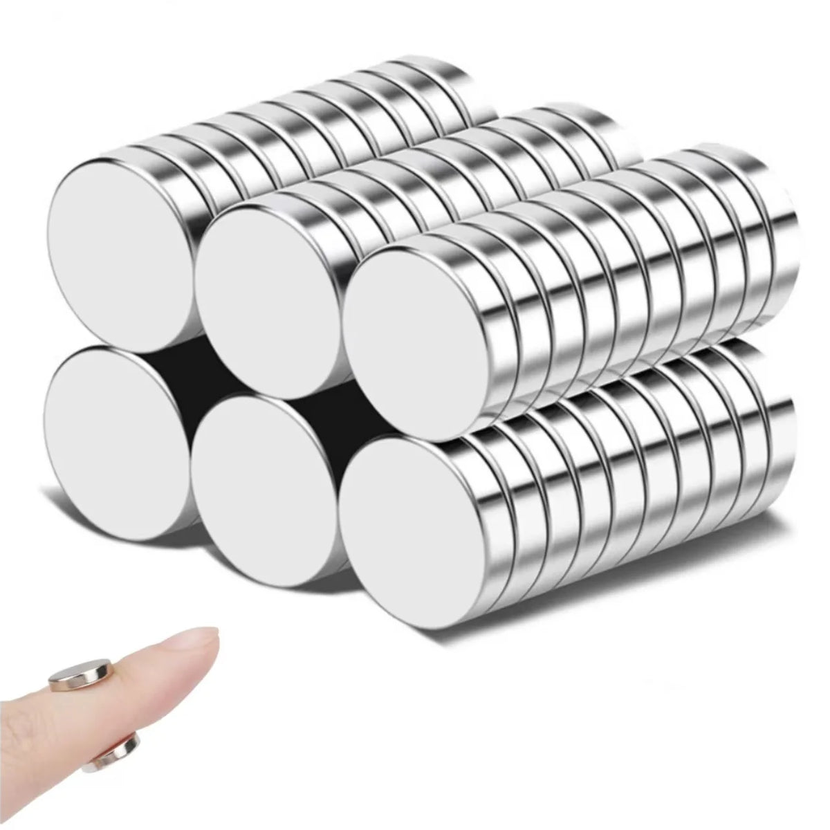 A stack of round, silver magnetic fridge stickers.