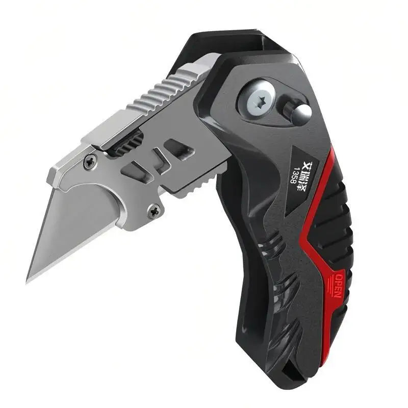A close-up view of a black folding utility knife with a silver blade and red accents.