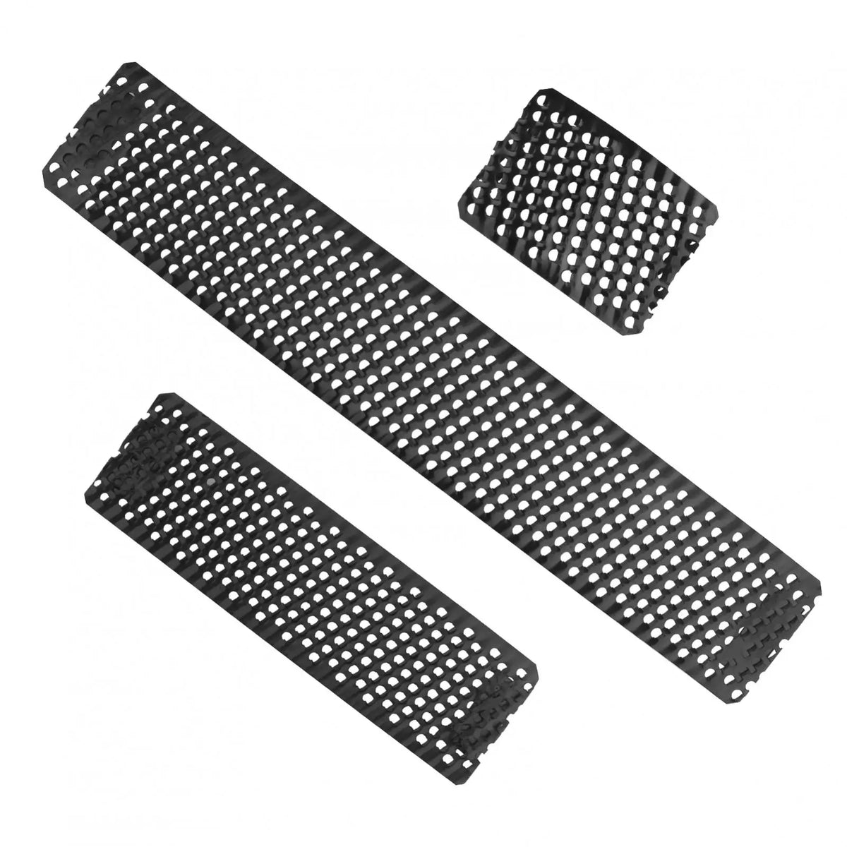 Four precision flat shaver replacement blades arranged in various orientations.