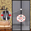 Close-up of a modern magnetic screen door showing insect protection features and a decorative patterned background.