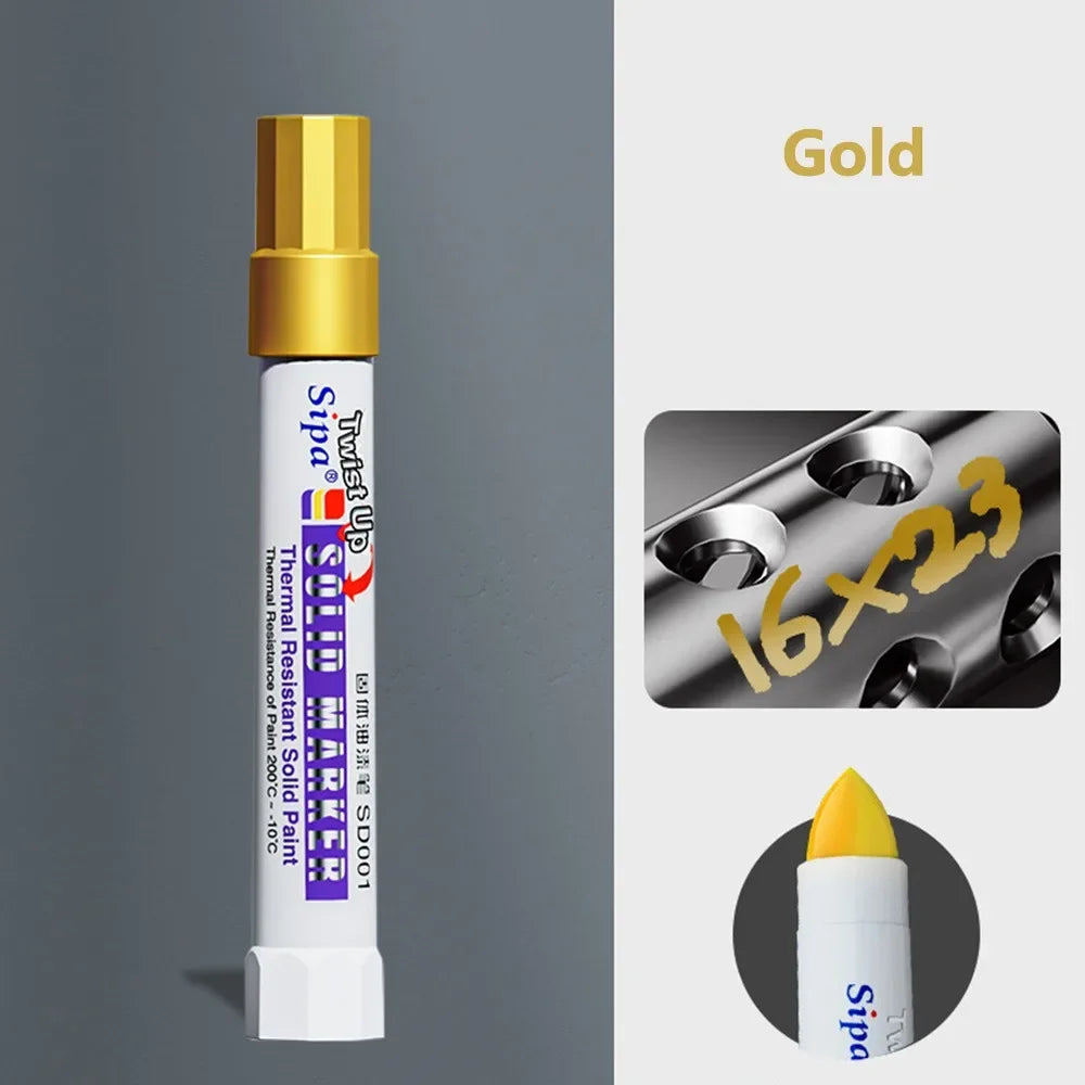 A gold and white solid paint marker pen with a tip, shown against a gray background.