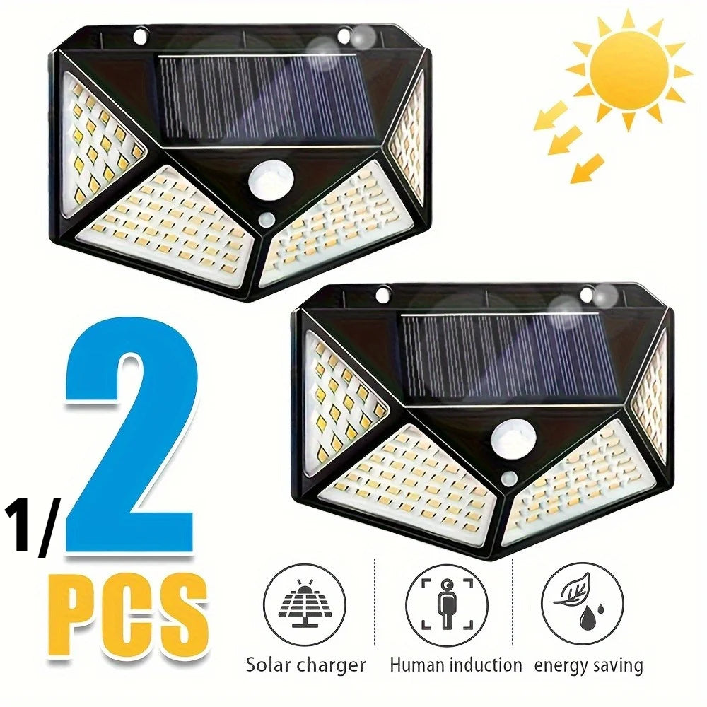 Two solar motion sensor security lights are shown with icons indicating solar charging, human induction, and energy saving.