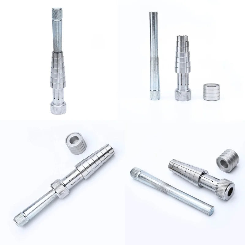 A collection of professional ring stretcher and expander tools, including various metal rods and expanding components.