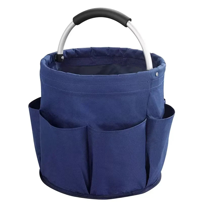 A navy blue folding storage organizer basket with a black handle.