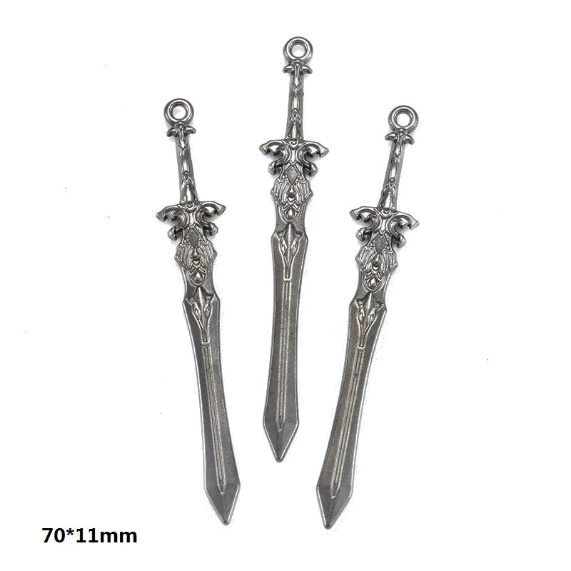 A set of three multi-style alloy charms for DIY jewelry making featuring ornate designs.