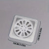 A square white mesh strainer with a circular opening is shown against a gray background.