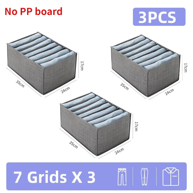 Three fabric storage organizer boxes with grids for versatile storage.