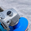 A close-up view of an integrated stone trimming polishing disc set with a silver body and blue disc.