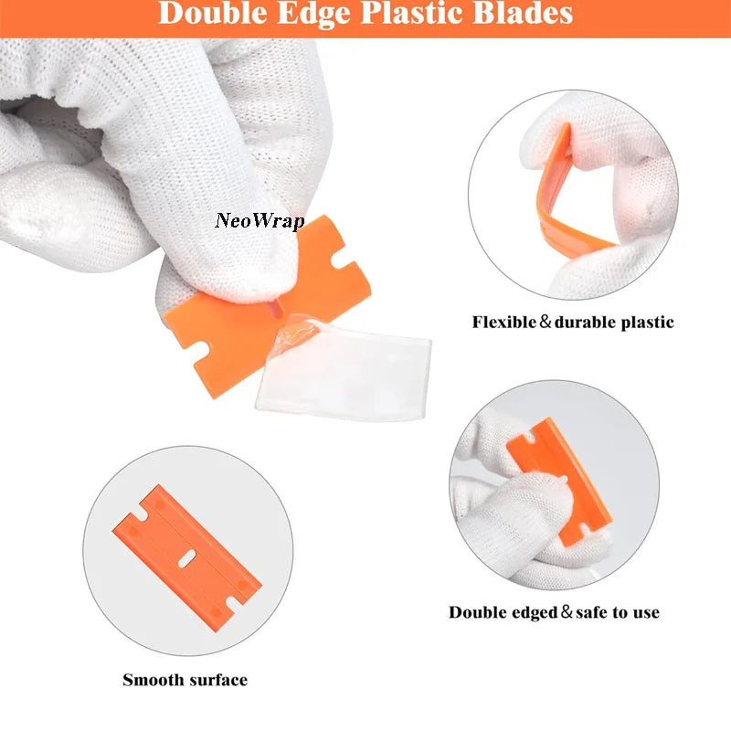 A hand wearing a white glove is holding an orange double edge plastic blade, demonstrating its smooth surface and durability.