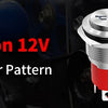 Primer plano de un interruptor Horn Button 12V con patrón de altavoz iluminado sobre fondo oscuro.