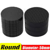 Two round rolls of black heavy duty self-adhesive Velcro tape with a 50mm diameter.