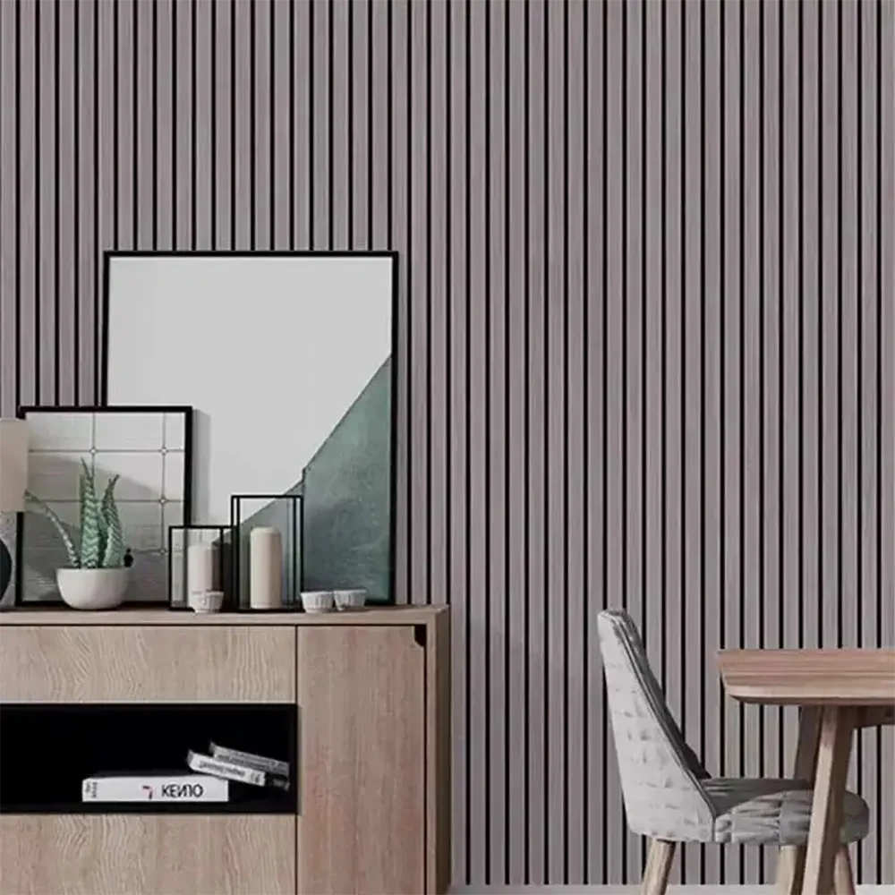A modern interior featuring a wooden grid wall, framed art, and minimalist furniture.