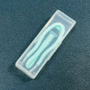 A clear plastic case containing a 5-piece portable contact lens tool kit with a light green instrument inside.