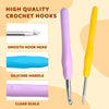 A set of high quality crochet hooks featuring smooth pink silicone handles and yellow grips with clear scale markings.